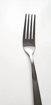 Silver fork on white background Stock Photos