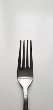 Silver fork on white background Stock Photos