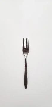 Silver fork on white background Stock Photos