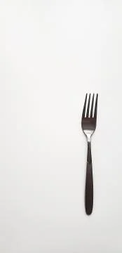 Silver fork on white background Stock Photos