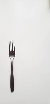 Silver fork on white background Stock Photos