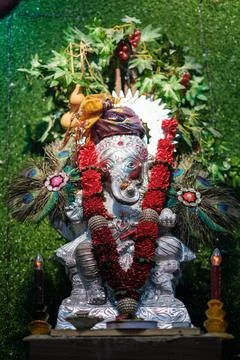 Silver Ganesha Structure with Decorative Accessories Stock Photos