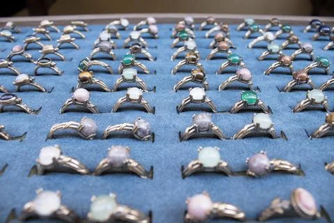 Silver Gemstone Rings in Showcase Stock Photos
