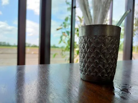 Silver glass on the table Stock Photos