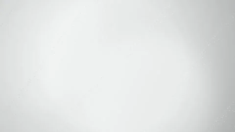 Silver glitter bands drift across a light surface in a seamless loop Stock Footage 340957645