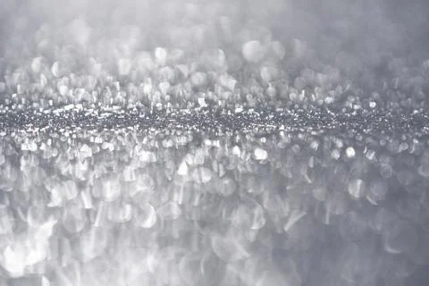 Silver glitter bokeh sparkle texture. Silver metallic shimmer background. Silver Stock Photos