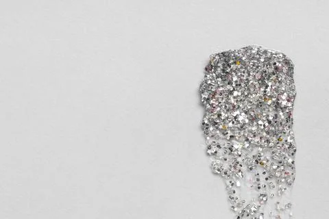 Silver glitter stroke on grey background Stock Photos