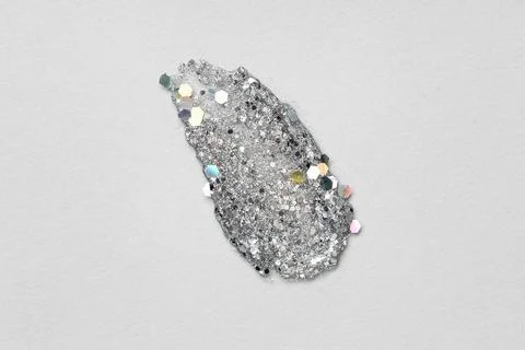 Silver glitter stroke on grey background Stock Photos