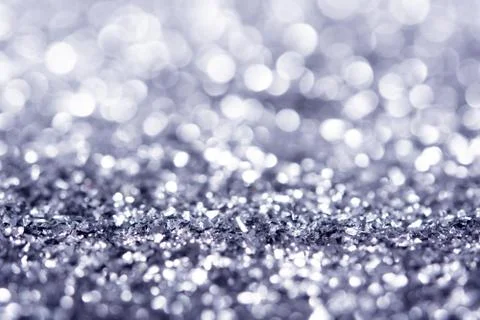 Silver glitter texture. Festive sparkling sequins background closeup. Stock Photos