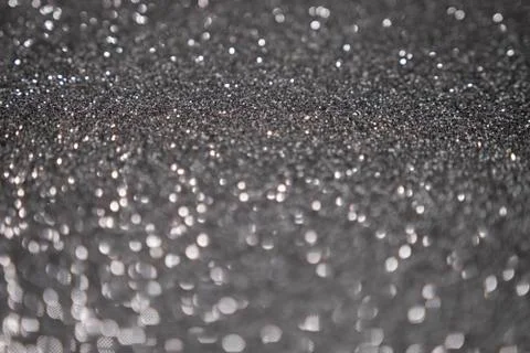 Silver glittering bokeh background New Year concept Stock Photos