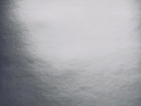 Silver gray background with gradient. Light reflective colored paper with a m Stock Photos