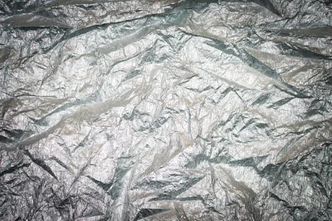 Silver gray background. Silver background with shiny uneven surface. Background Stock-Fotos