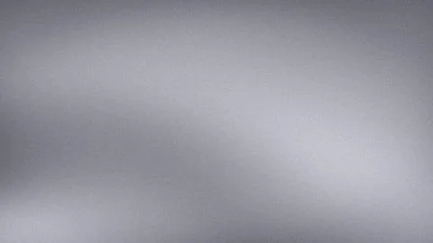 Silver gray grainy textured background with smooth gradient blur effect and.. Stock Photos