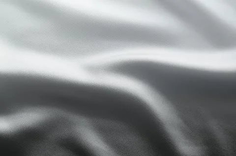 Silver grey silk gradient texture with soft flowing folds for luxury abstra.. Stock Photos
