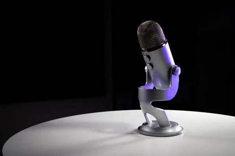 Silver grey USB condenser microphone with adjustable tabletop stand Stock Photos