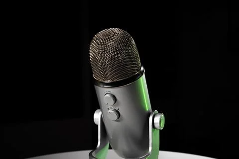 Silver grey USB condenser microphone with adjustable tabletop stand sitting o Stock Photos