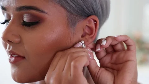 Silver Haired Bride Putting on Her Earing Stock Footage 118814621