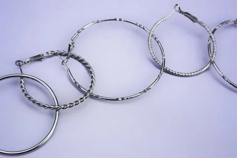 Silver hoop earrings Stock Photos