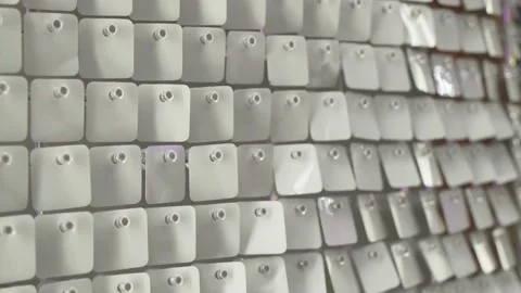 Silver iridescent sequins that reflect light. abstract background with sparkles Stock Footage 238744148