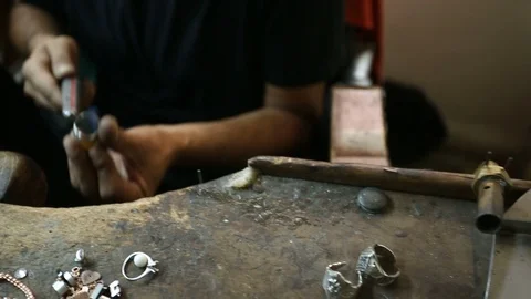 Silver jeweler master working in workshop. hand made silver ring Stock Footage 118751658