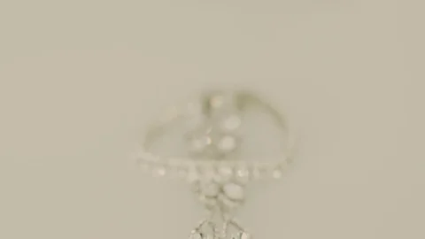 Silver jewelery on table Stock Footage 71182805