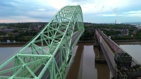 Silver Jubilee bridge aerial view rising between the railway viaduct 库存影片 342407062