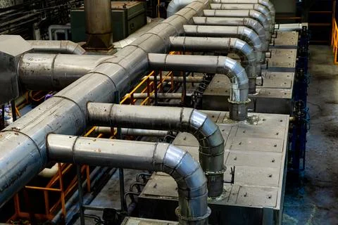 Silver Labyrinth: Ductwork Mastery in a Russian Metal Coating Facility Stock Photos
