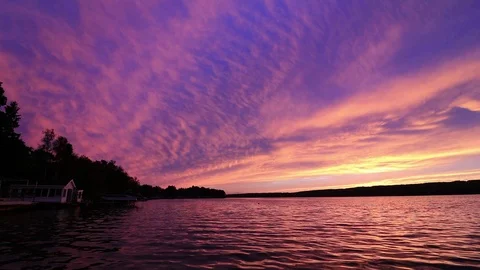 Silver Lake Sunset vivid violet with boathouse Stock Footage 118696319