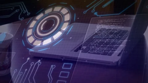 Silver laptop sitting on dark desk, on startup forming HUD, sliding code panels Stock Footage 329700321