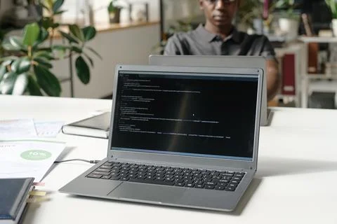Silver Laptop on White Table 写真素材
