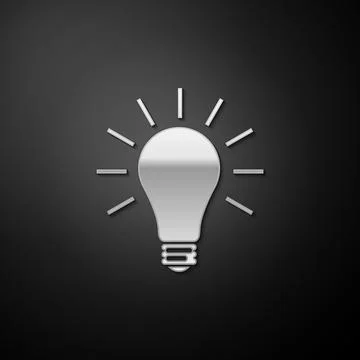 Silver Light bulb with rays shine icon isolated on black background. Energy and Stock Illustration