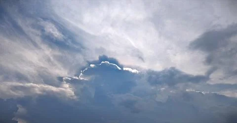 Silver Lining Cloud Formation Under Sunlight Stock Photos