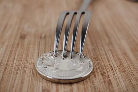 Silver Litecoin and fork Stock Photos