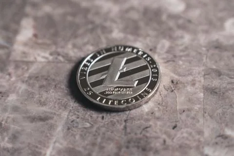 Silver Litecoin Cryptocurrency Token Stock Photos