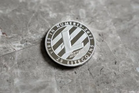 Silver Litecoin Cryptocurrency Token Stock Photos