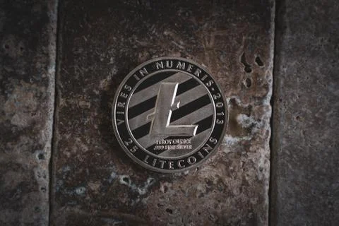 Silver Litecoin Cryptocurrency Token Stock Photos