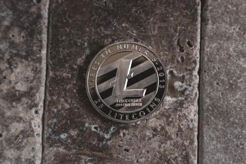 Silver Litecoin Cryptocurrency Token Stock Photos