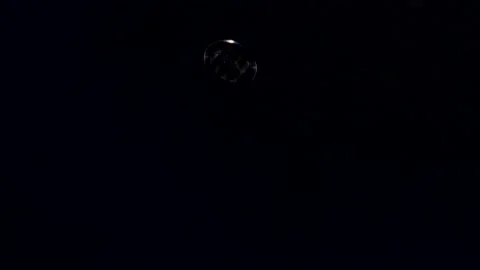 Silver Litecoin flipping in air in slow motion against black background Stock Footage 217947238
