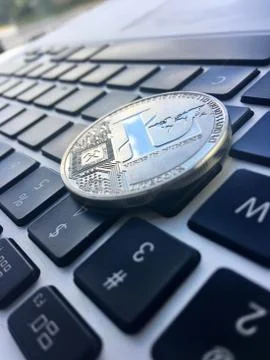 Silver Litecoin on keyboard Foto stock