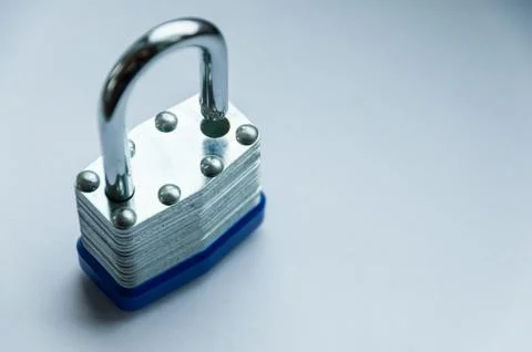 Silver lock for locking the barn. Small padlock Stock Photos