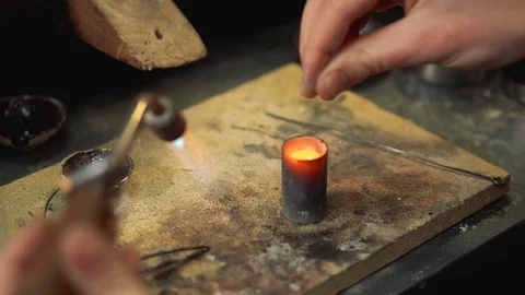 Silver melting technology in the form of using a soldering device Stock Footage 72965333