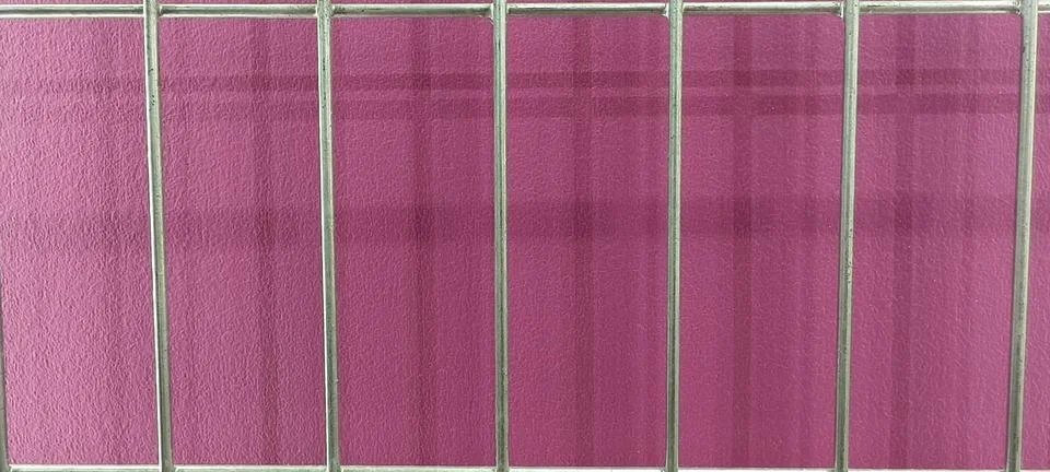 Silver metal bars forming a rectangular grid 스톡 사진