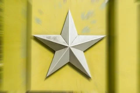 Silver metal five pointed Soviet star Stock Photos