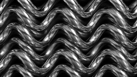 A silver metal object with a wavy pattern. The pattern is made up of many sma Stock Photos