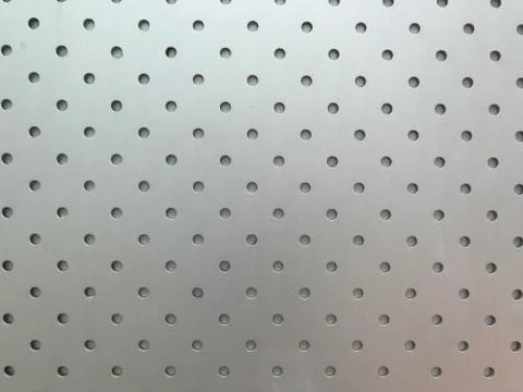 Silver metal sheet surface with small circle hole Stock Photos