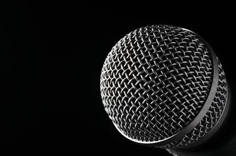 Silver microphone on a black background. Stock-Fotos