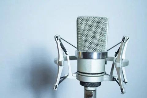 Silver microphone on white background Stock Photos