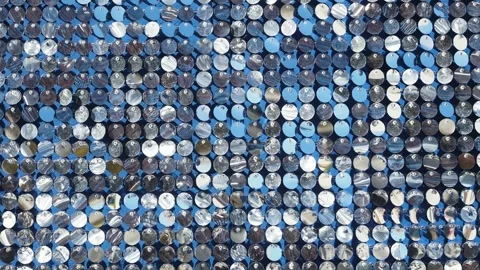 Silver mirror sequins sparkle and move in the wind, Stock Footage 243686750
