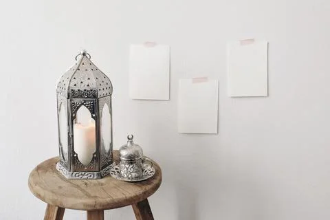 Silver Moroccan, Arabic lantern with cup of Turkish tea, coffee drink on old Фото