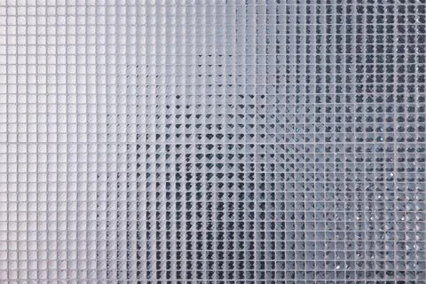 Silver Mosaic pattern of tiles.Wall is decorated with stained glass small p.. Foto stock